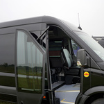 Black Minibus with tourist door in front