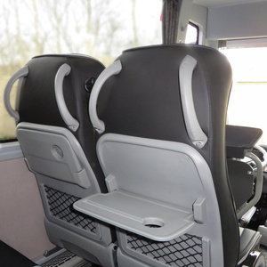 Busseats with foldable food tray and elastic storage net